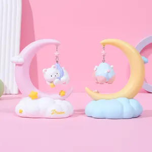 Macro detail view of cute moon and bear fairy tale night light in pastel colors