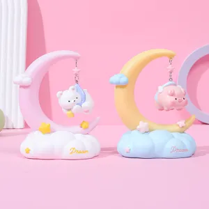 Cute moon night lights with bear and pig figurines on cloud bases for nursery decor