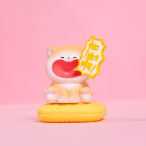 Detailed macro view showing a cute shouting cat resin figurine on its yellow magnetic base