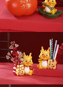 Detail view of Chinese Zodiac Dragon figurines used as a pen holder and festive decor