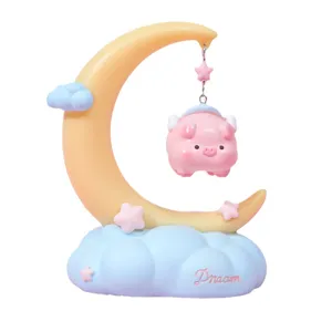 Cute resin moon fairy tale night light with hanging pink pig and blue cloud base