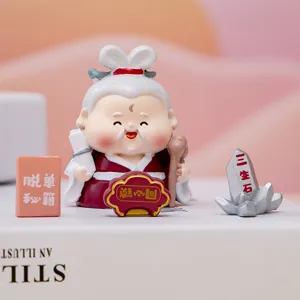 Close-up of a cute cartoon elderly deity figurine with traditional symbolic accessories.