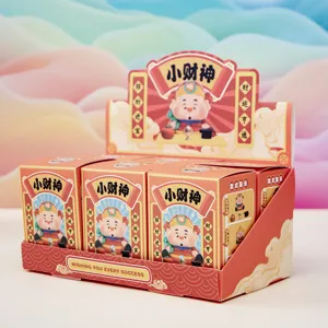 Little God of Wealth blind box display set with cartoon figures in vibrant red packaging
