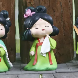 Close-up of a cute Tang Dynasty style girl resin figurine for elegant home decor
