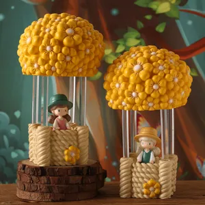 Detail view of cute girl figurine in yellow flower hot air balloon resin night light