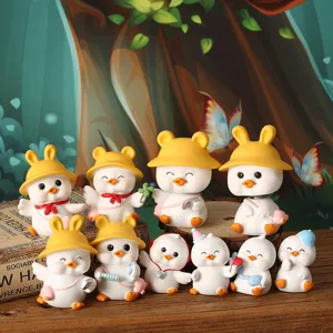 Group shot of ten varied cute resin duck figurines for car and home desktop decor