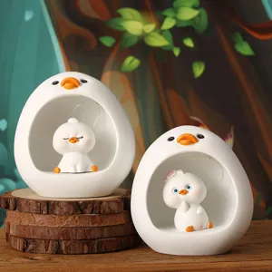 Set of two cute cartoon duck night light resin ornaments for home decor and desktop gifts.