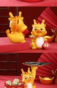 Detail view of a golden dragon tray figurine for key storage and festive home decoration