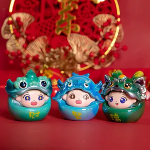 Three cartoon dragon resin figurines Chinese New Year lucky charm blind box ornaments.