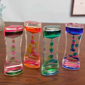 Primer plano de temporizadores de burbujas líquidas en varias combinaciones de colores