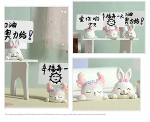 Detailed view of cute cartoon resin animal memo holders in rabbit and deer shapes