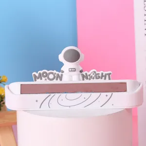 Detailed view of a creative cartoon astronaut car temporary parking phone number plate