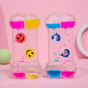 Paire de sabliers à huile en forme d'os avec motifs de smileys et de dauphins mignons