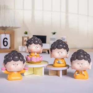 Set van vier schattige cartoon Boeddha beeldjes voor zen huisdecoratie en cadeau