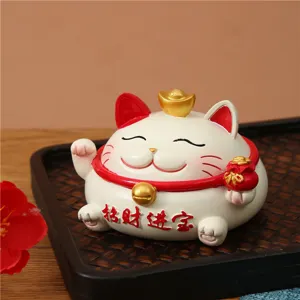 Adorable white Maneki-neko lucky cat figurine with gold ingot for car dashboard home decoration