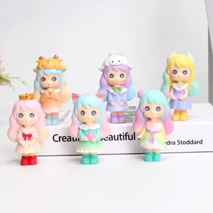 Group of six colorful Light-chasing Girl blind box figurines on a white book display