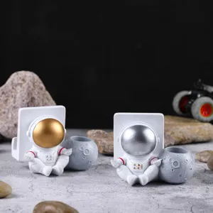 Soportes creativos para teléfono de astronauta en resina con visores dorados y plateados