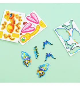Detailansicht der 3D-Insektenpuzzle-Teile und Pappbögen für das DIY-Basteln von Kindern