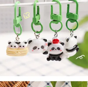 Detailed view of cute cartoon panda keychains, wonderful student schoolbag pendants and lovely gifts.