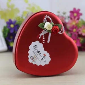 Elegant red heart-shaped metal gift box with rose flower decor and romantic message