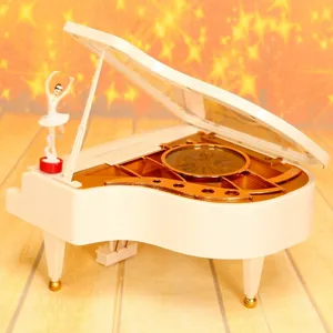 Elegante weiße Flügel-Spieluhr mit Aufziehmechanismus und rotierender Ballerina-Figur