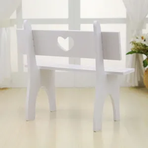 White decorative miniature bench with heart-shaped cutout for home decor and doll display