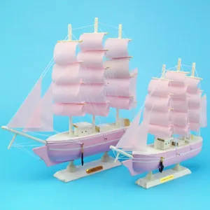 Handcrafted pink wooden sailing ship model for Mediterranean home decor gift