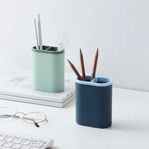 Minimalist dual-compartment desktop pen holder, plastic stationery organizer for office and school.