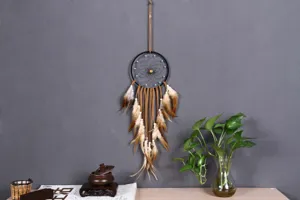 Bohemian brown feather dream catcher detail, handmade wall hanging decor for bedroom.