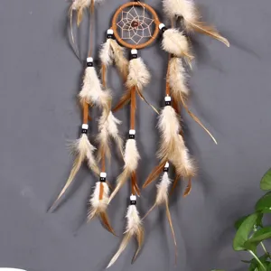 Handmade Indian style feather dream catcher hanging ornament detail view for home wall decor