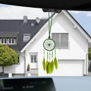 Handmade green dreamcatcher car hanging ornament with vibrant feathers and beads detail