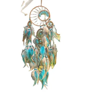 Handmade bohemian Sun and Life Tree dream catcher with blue feathers and stones