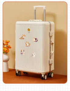 Close-up view of cute cartoon cat and tiger stickers applied to a white suitcase surface