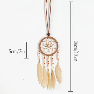 Close-up showing dimensions of ethnic dreamcatcher necklace with feathers and beads