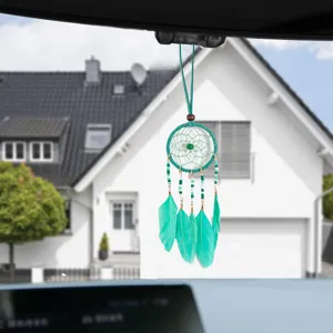 Handmade dreamcatcher car hanging ornament featuring turquoise feathers and beads
