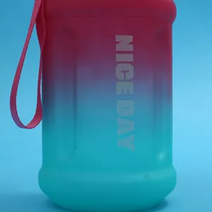 Gradient plastic water bottle with strap, large capacity portable tumbler for sports and daily use.