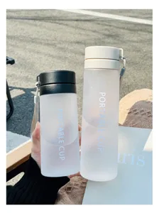 Portable frosted plastic water bottle with strap, minimalist daily sports cup for students.