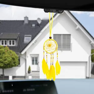 Handmade yellow dreamcatcher car mirror hanging ornament with vibrant yellow feathers