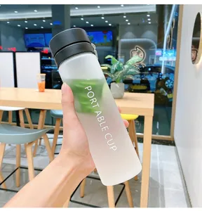 Frosted plastic water bottle with portable strap, ideal for outdoor sports and travel use.