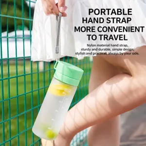 Plastic water bottle with strap for students and sports, portable design, 600ml capacity.