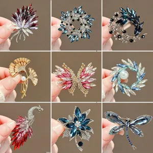 Stunning crystal rhinestone insect and flower brooches set, elegant fashion jewelry gift.