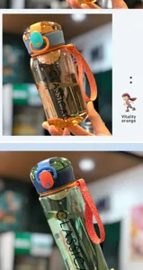 Borraccia sportiva in plastica grande capacita tazza fitness portatile con cinturino e coperchio ribaltabile.