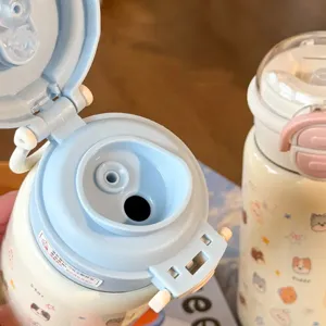Cute cartoon kids thermos water bottle with 316 stainless steel straw cup main view.