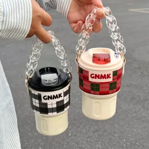 Close-up of portable 316 stainless steel coffee cups with decorative acrylic chain handles.