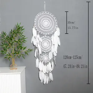 Bohemian handmade white dream catcher wall hanging with feathers for indoor home decor.