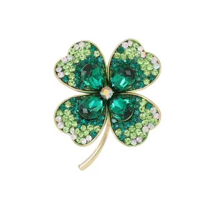 Exquisite four-leaf clover brooch, elegant green crystal rhinestone pin for women jacket accessories.