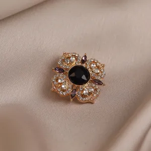 Close-up detail view of the exquisite rhinestone floral brooch showcasing fine craftsmanship.
