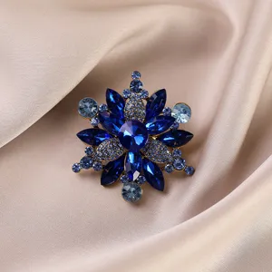 Elegant blue rhinestone flower brooch, vintage crystal alloy lapel pin for women coats and sweaters.