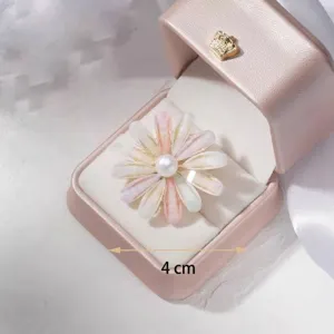 Elegant daisy flower brooch with pearl center in a pink jewelry box, 4cm diameter