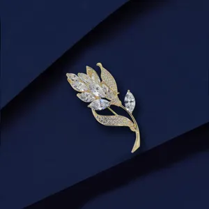 Exquisite gold-plated cubic zirconia wheat flower brooch detail shot, elegant jewelry accent.